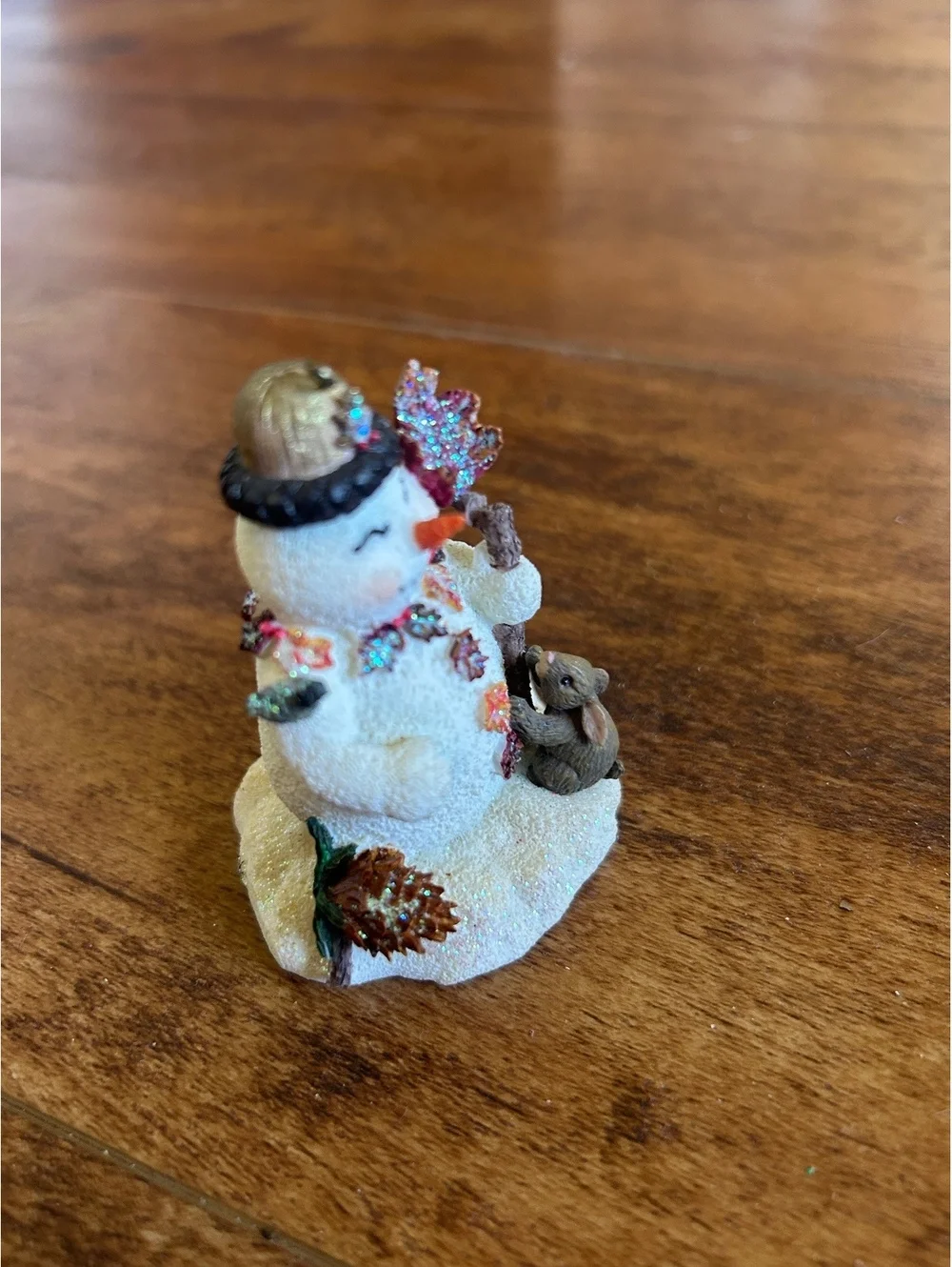 Small Decorative Snowman Figurine with Acorn Hat and Leaf Staff